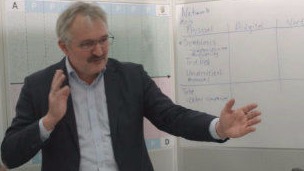 Creative workshop with a speaker at a whiteboard